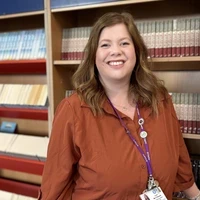 Image of Elena Russell smiling at camera